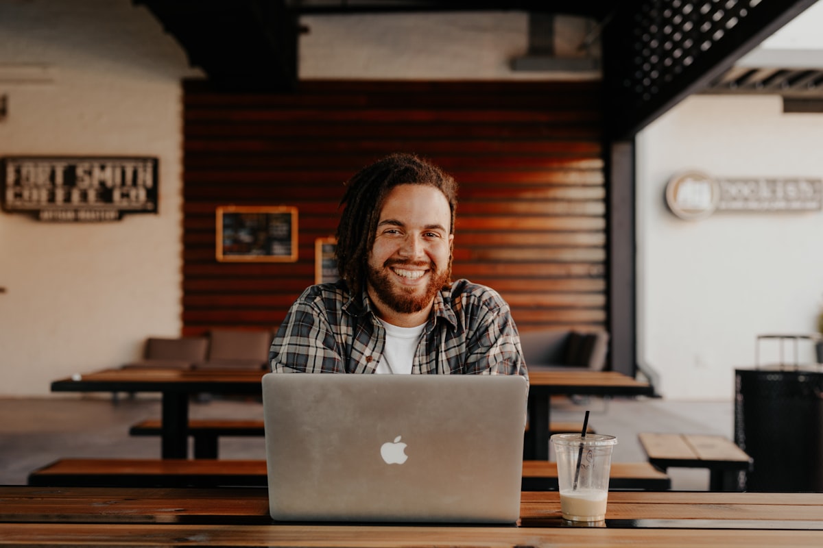 Restaurant owner reviewing BackOfficePro on a laptop